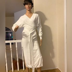 Beautiful white sweater pull over long sleeve dress, new with out tags